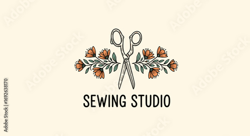 Artistic hand drawn scissors embellished with delicate flowers above sewing studio text