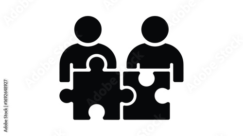 Two people figures connecting puzzle pieces representing teamwork and collaboration