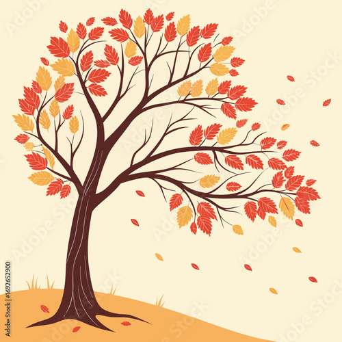 Autumn tree with colorful falling leaves on a windy day
