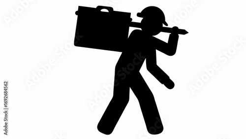Silhouette of a construction worker carrying a toolbox and a tool on his shoulders in black and white