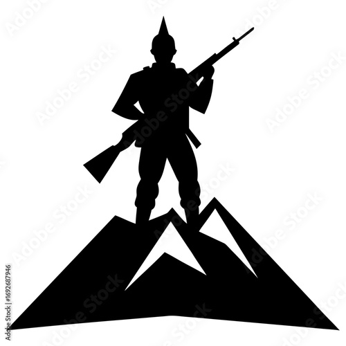 Silhouette of a soldier with rifle standing on mountain peak