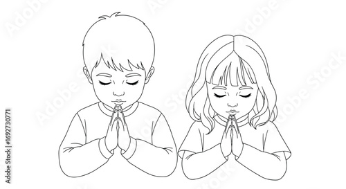 Two young children praying together with closed eyes and clasped hands