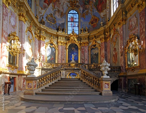 Ornate Baroque stairway in a richly decorated hall