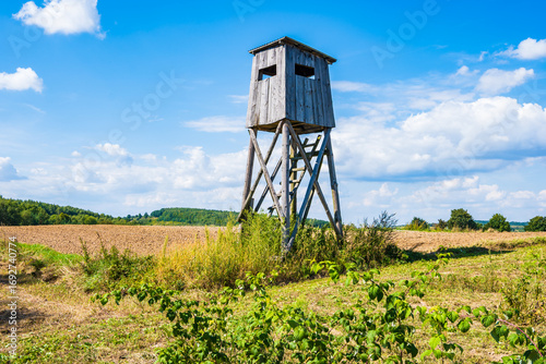 Fotografie Observation tower for hunters on farming field, Roztocze region, Poland