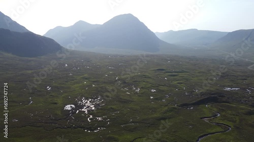 Aerial view of the Pass of Glencoe and the peak of Buachaille Etive Mor (the Great Shepherd of Etive) in the Scottish Highlands of Lochaber Scotland UK