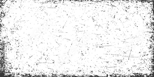 Abstract black and white grunge texture of a dirty, splattered glass surface with paint splashes and water drops