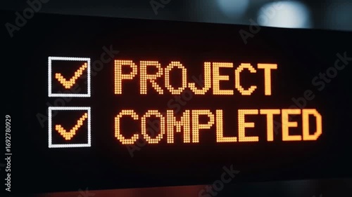 Project Completion Animation Showing Checkmarks on Digital Display Screen in Orange
