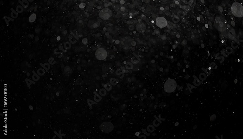 Floating Dust Particles on Black Background