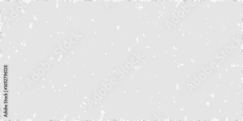 Subtle textured background with distressed edges and scattered speckles for graphic design