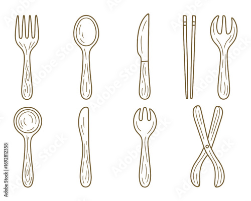 Wooden cutlery set on brown background: forks, spoons, chopsticks, and tongs