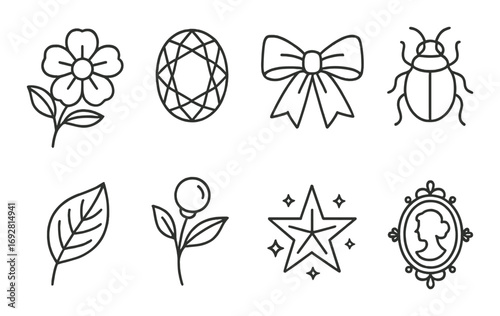 Vintage icon set featuring floral, geometric, insect, and silhouette designs