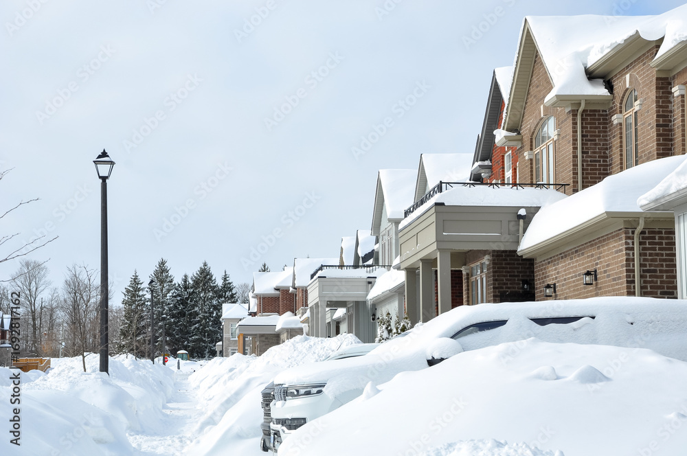 Fototapeta premium Snow covered houses in winter