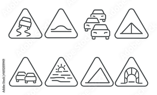 Set of eight traffic warning signs with various road symbols in gray triangular design