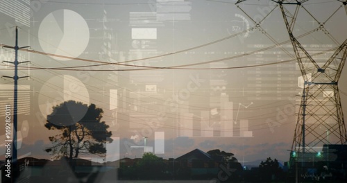 Showing steel tower spanning power lines above roofs at suburban dusk with data overlay, copy space