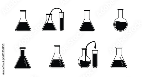 chemical flasks with various liquids and tubes connected