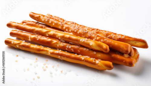 Pretzel Sticks With Salt Resting On A White Surface Perfect For Snacking