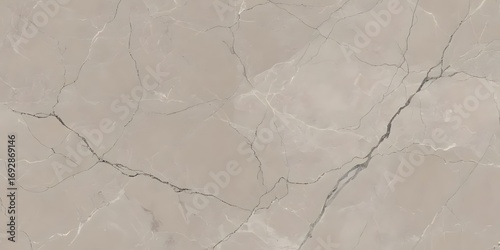 Sophisticated greige marble slab showcasing delicate dark veining. A luxurious and natural stone texture background for elegant interior design projects