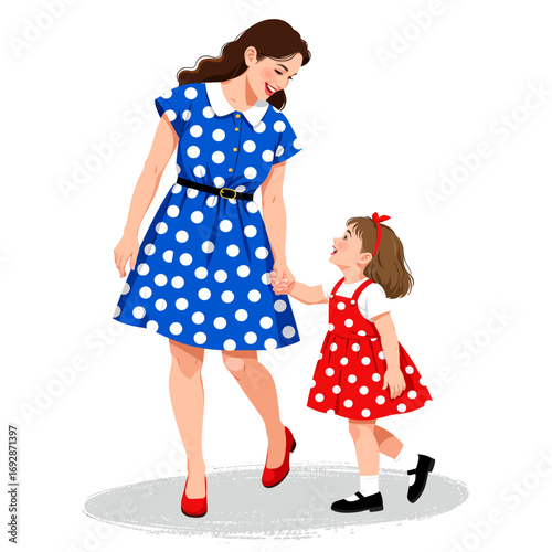 Mother and Daughter Dancing in Polka Dot Dresses