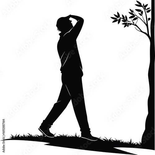 Man walking in nature silhouette looking up