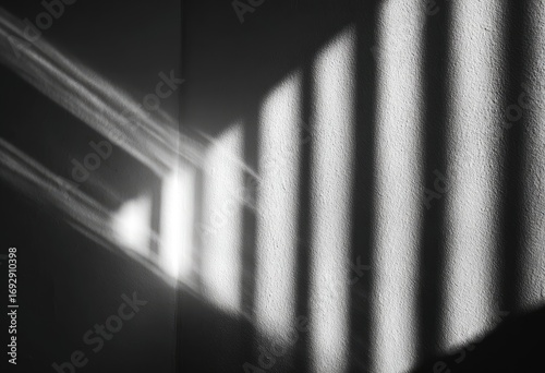 Light streaks and shadows through a window