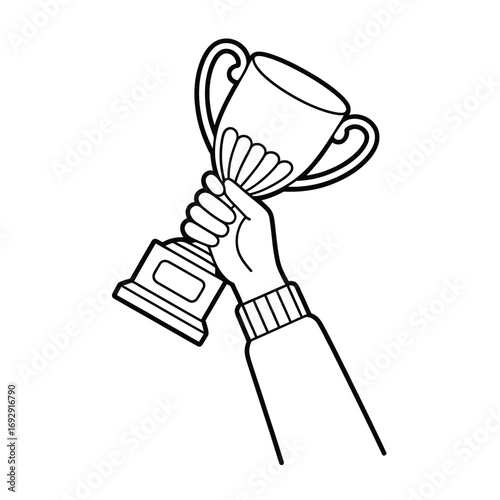 Hand holding up a trophy in celebration of victory and achievement