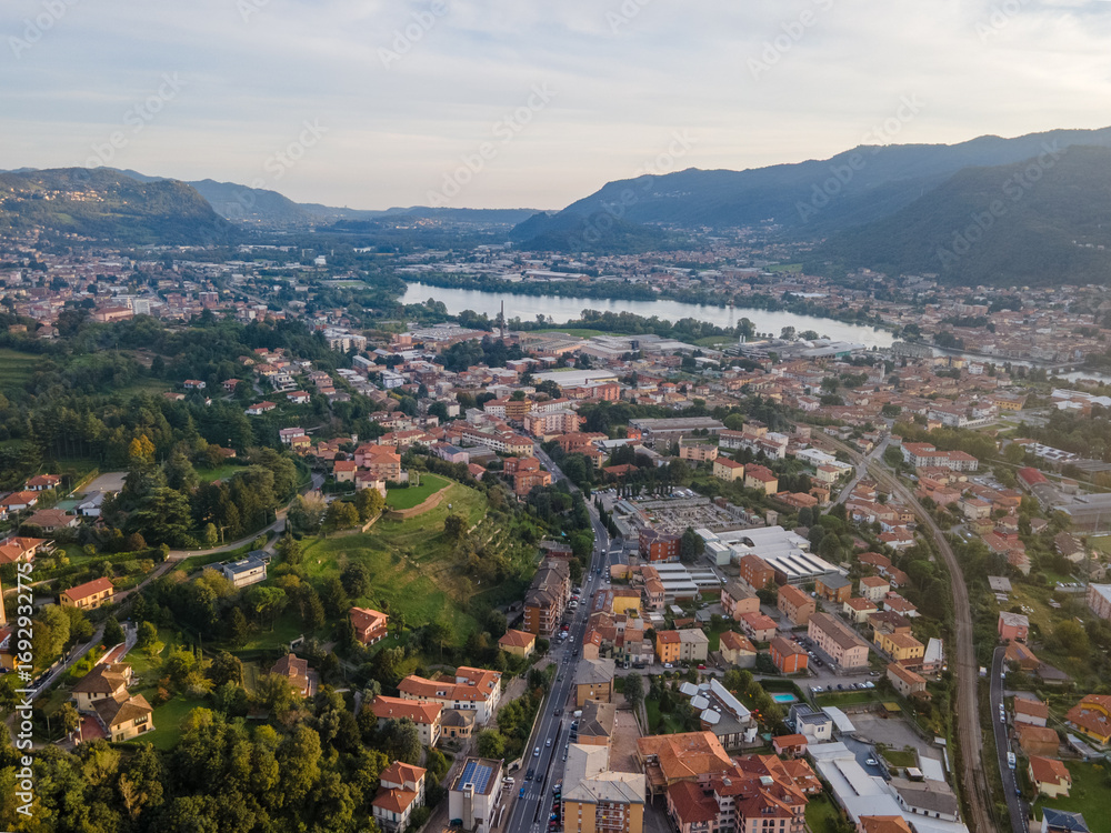 Fototapeta premium Aerial landscape of Lecco Maggianico Lago di Garlate Lake fall Italian Alps mountains Lombardy