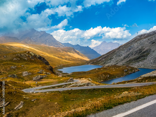 Small alpine lakes and mountains at Nivolet mountain pass, Italy.