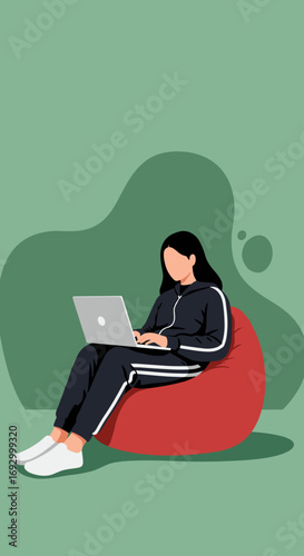 Woman in a tracksuit comfortably works on a laptop from a red bean bag, depicting remote work, freelance, or relaxed study at home.