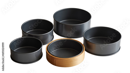 Set of Professional Non-Stick Round Cake Pans and Springform Tins in Various Sizes for Baking, Isolated on White Background
