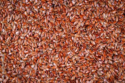 Organic linseed or flaxseed texture or surface as background.