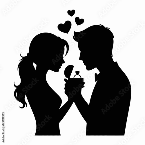 Silhouette of a man proposing to a woman with a ring and hearts