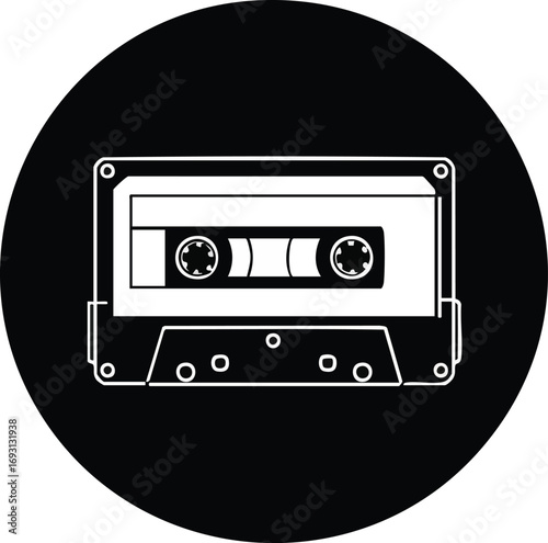 A minimalist white outline of a vintage audio cassette tape is presented within a bold black circular icon, evoking nostalgia for classic music and retro technology.