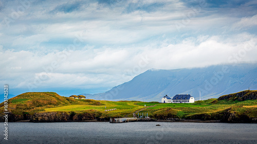 Building on green peninsula in Iceland near Reykjavik
