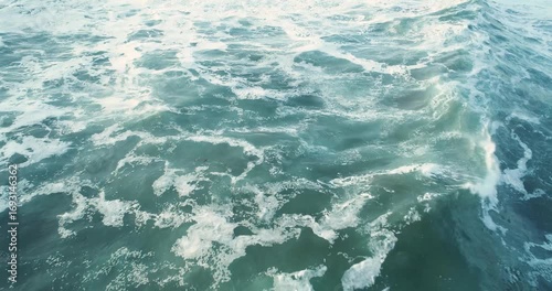 Aerial top-down view of churning ocean water texture