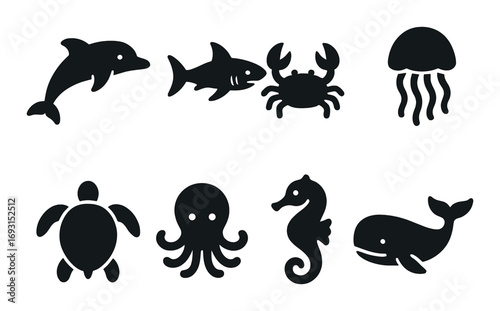 Marine life silhouette icon set. featuring dolphin, shark, crab, jellyfish, turtle, octopus, seahorse, and whale symbols.
