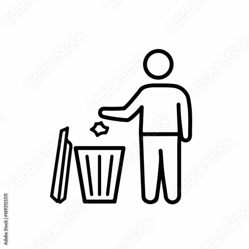Person throwing crumpled paper into a trash bin demonstrating responsible waste disposal and cleanliness concepts