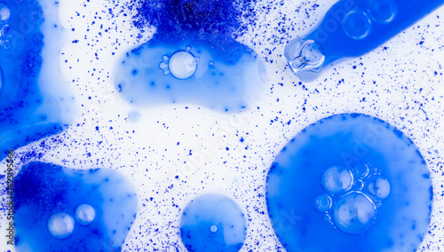 Close up of Blue Copper Peptides in Powder and Liquid Form