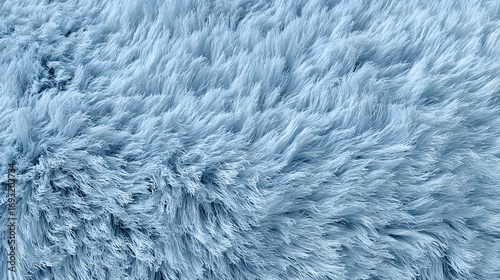 Soft fluffy blue fur texture background perfect for fabric design, cozy interior decoration, or creative artwork