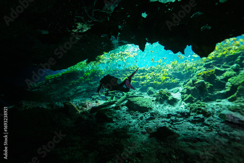 Cave Diver in Nicte Ha Cenote in the Yucatan Peninsula, Mexico
