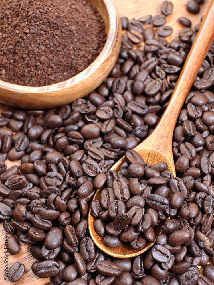 Fototapeta premium Flatlay of coffee beans and wooden spoon.