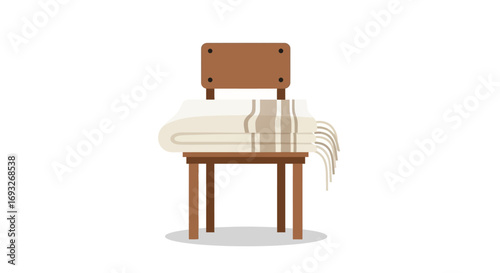 A simple wooden chair with a folded, textured blanket draped over its seat and a portion of its back.