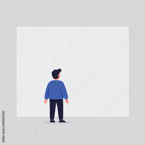 Person gazes at blank canvas, ready for an idea or creation