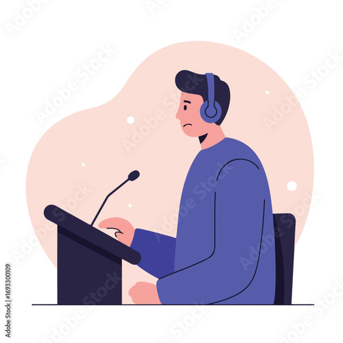 At podium w/ mic