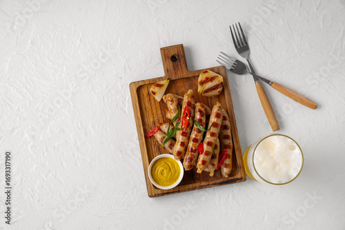 Wooden board with tasty gri...