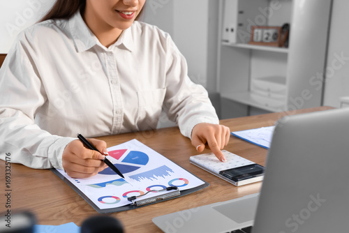 Female accountant working w...