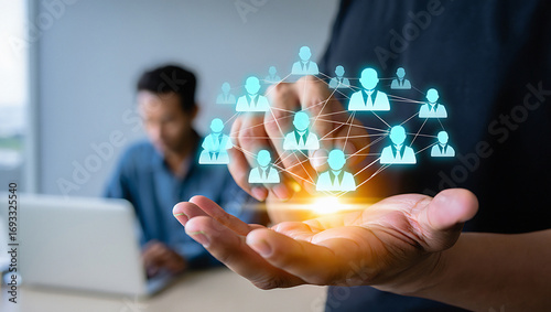 Human resources technology displaying digital network of people in a modern office setting