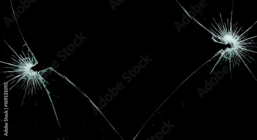 Fragmented Reality: Cracks spiderweb across a sleek, dark expanse, creating a visual representation of fragility and brokenness.