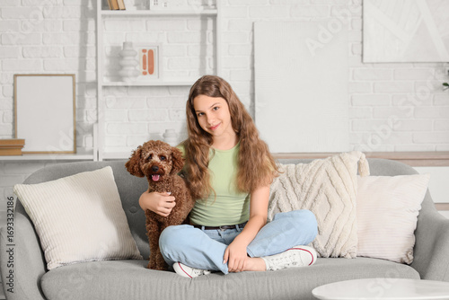 Teenage girl with Poodle do...