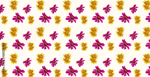 A seamless pattern featuring yellow daisies and pink zinnias. Perfect for textiles, wallpapers, gift wrap, and decorative projects.
