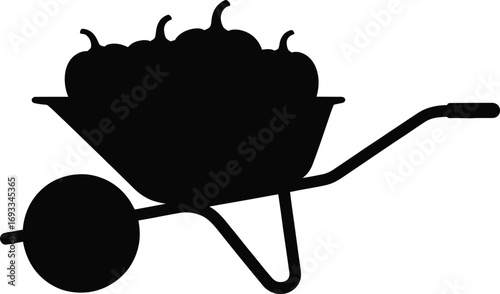 Black silhouette of wheelbarrow filled with pumpkins